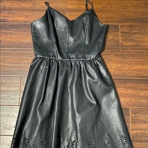 Forever 21 black faux leather dress with eyelet details on bottom